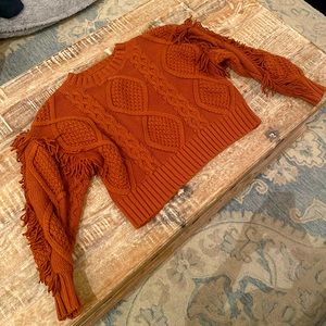 Women’s Line and Dot sweater from revolve